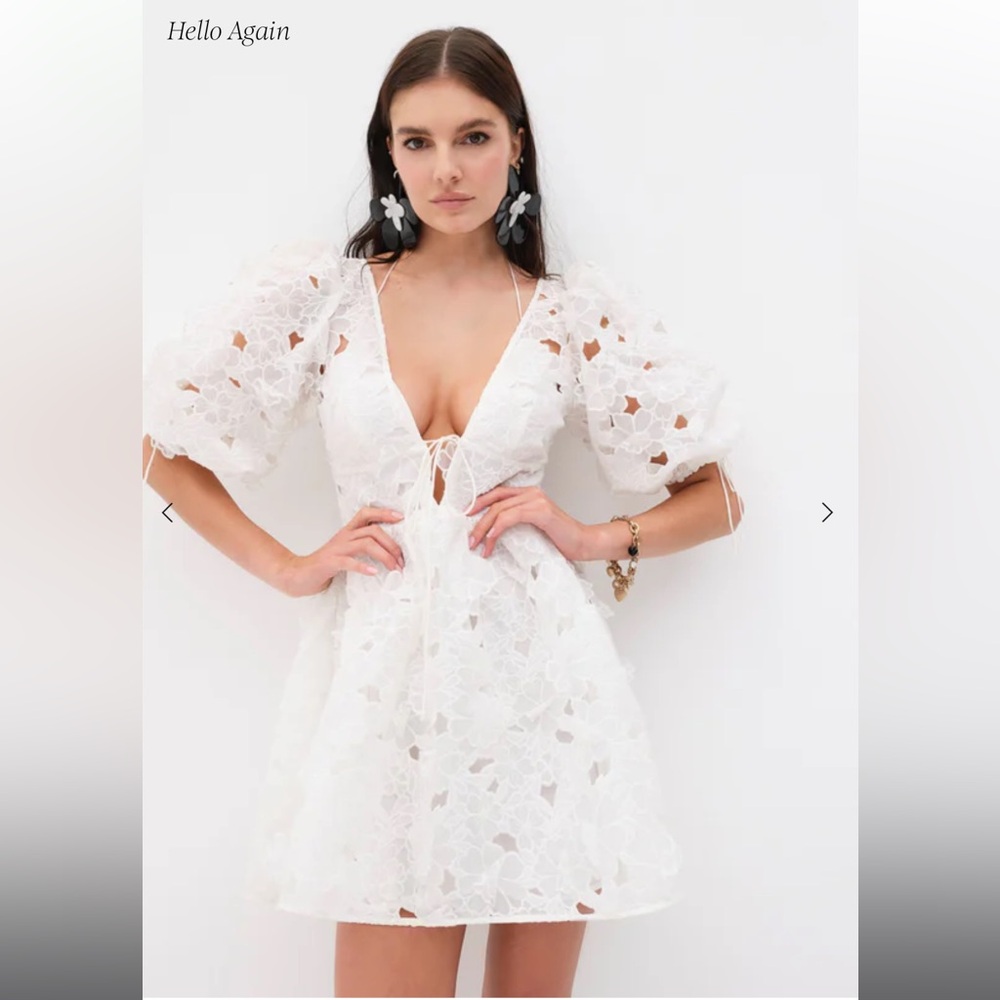For Love and Lemons white mini dress. New with tags, never worn!